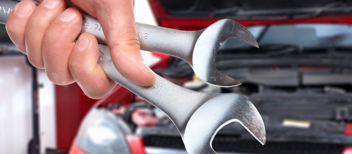 19354707 - hand with wrench  auto mechanic